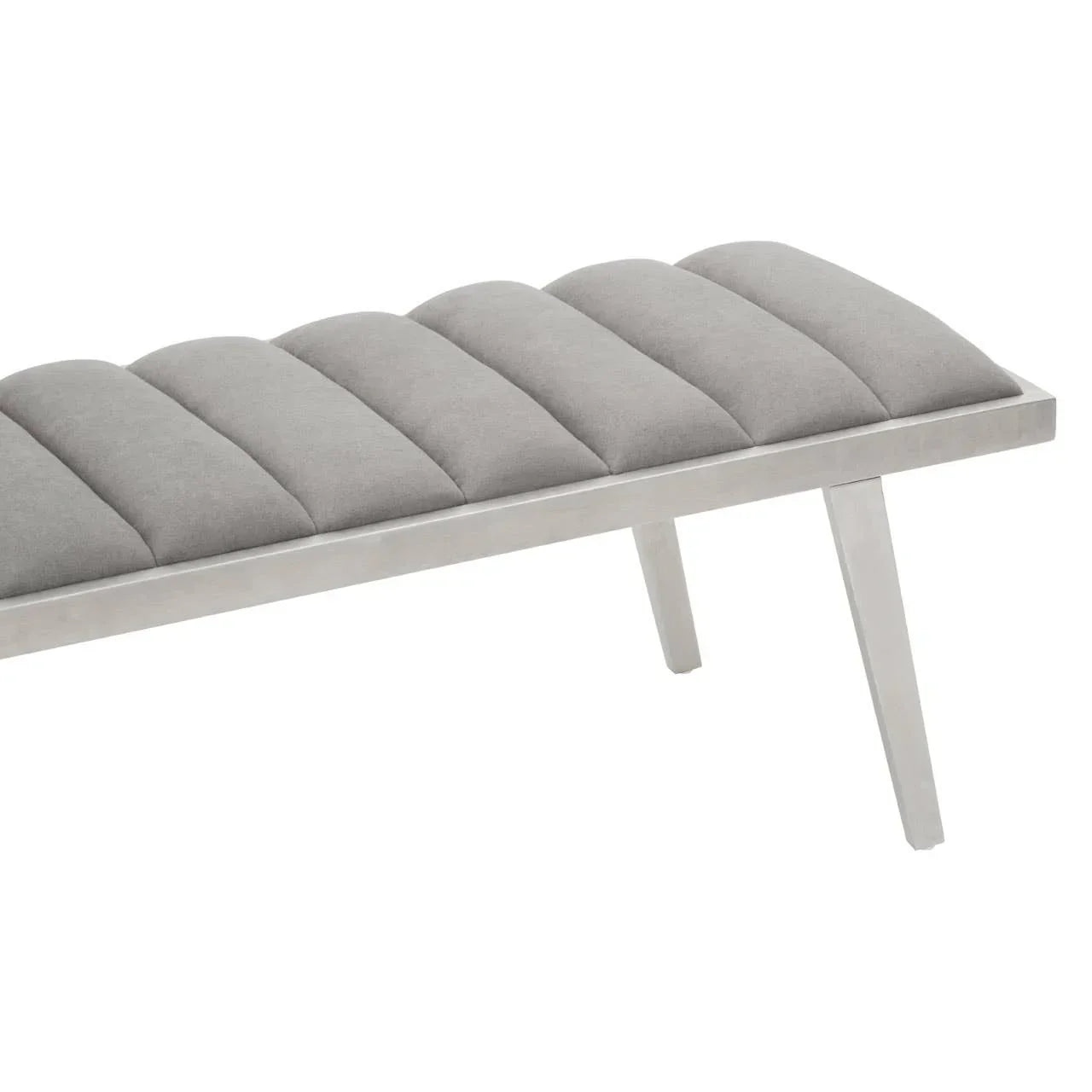 Grey upholstered bench with channel tufted seat and angled metal legs