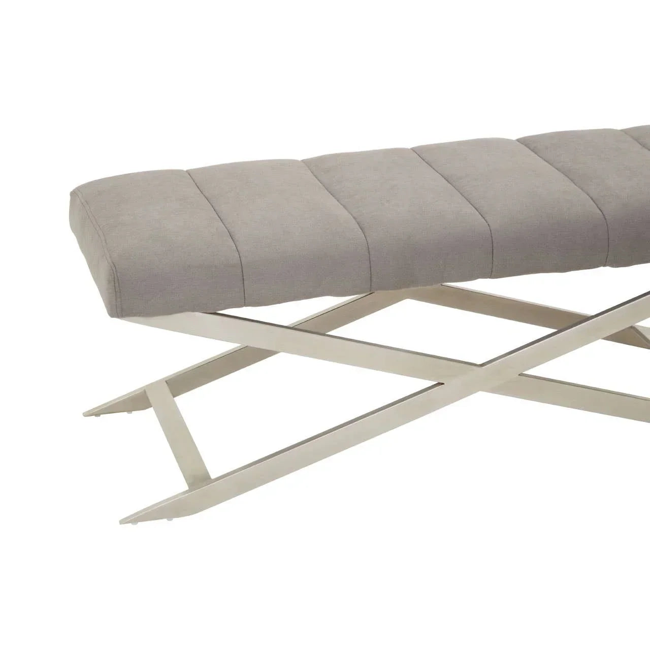 Grey upholstered bench with metal cross legs, side angle view