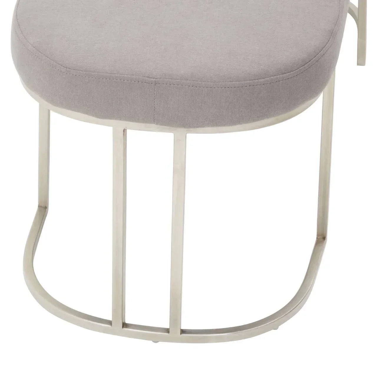 Grey fabric stool with oval cushioned seat and polished metal frame, close-up view