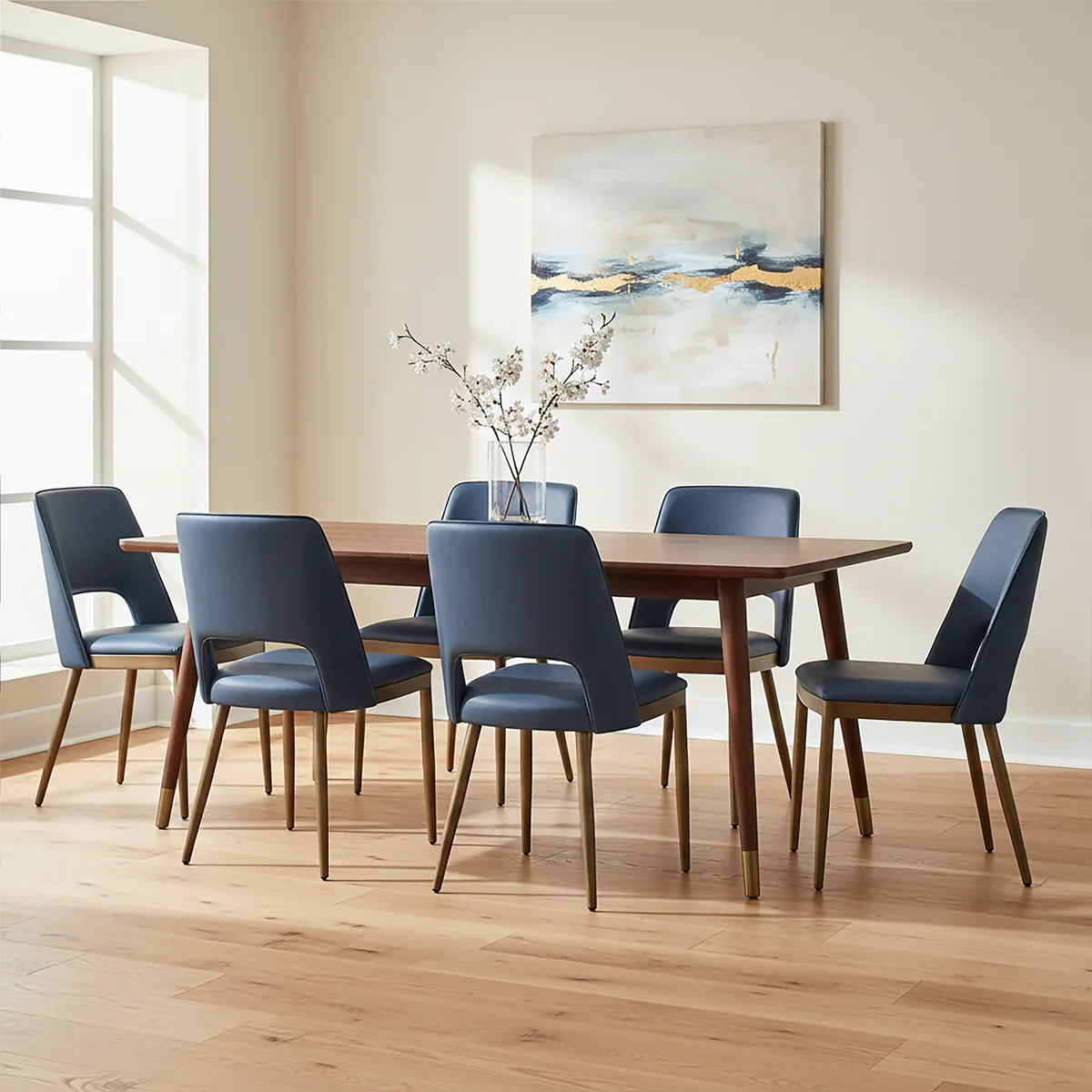 Walnut dining table set with six blue upholstered chairs in modern dining room