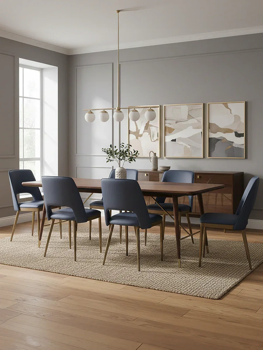 Wood dining table with six blue chairs on beige rug in modern dining room
