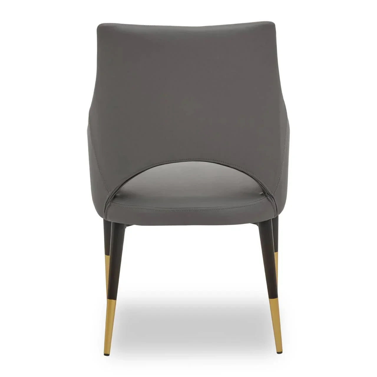 Grey dining chair with curved backrest, open lower back, black legs and gold metal tips
