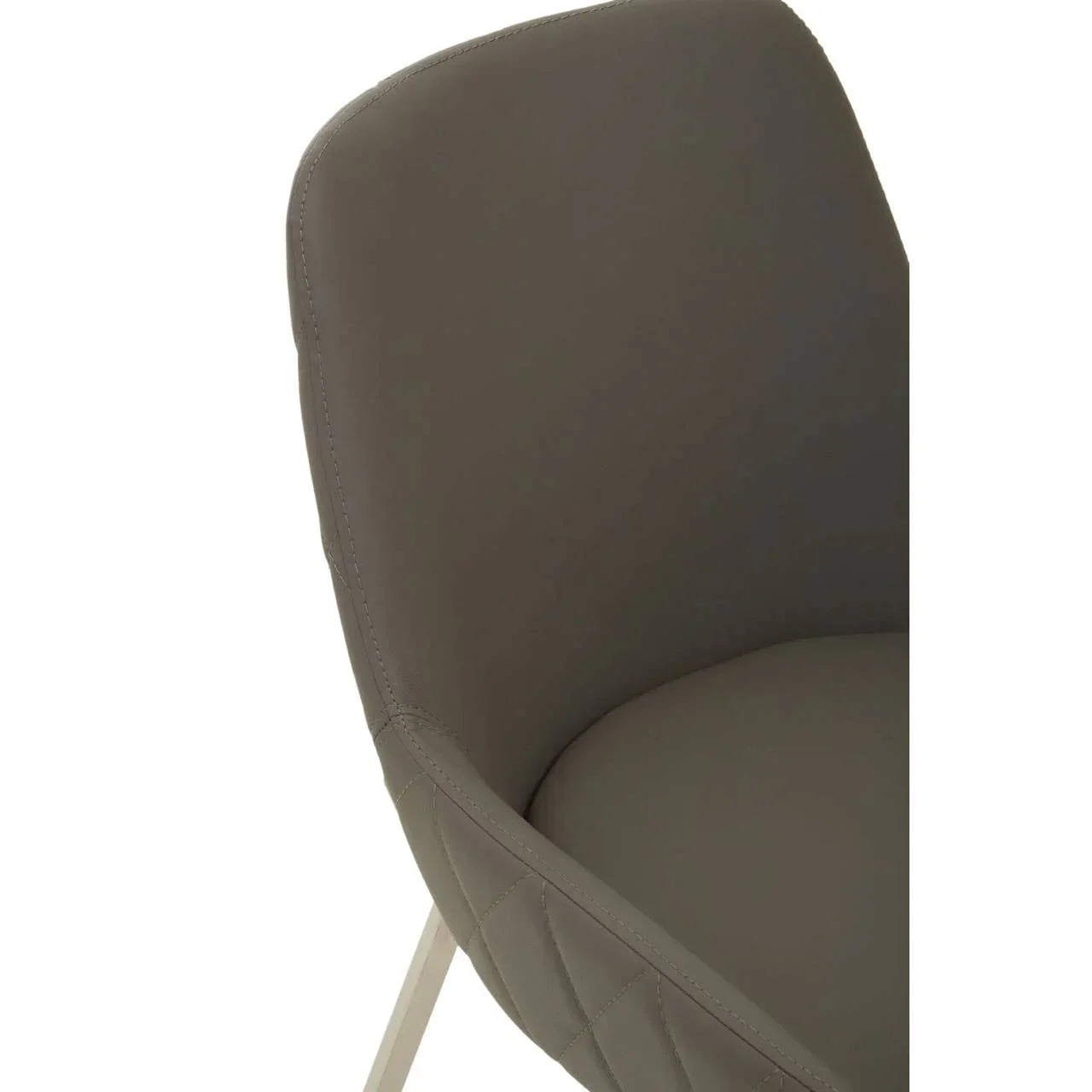 Taupe upholstered dining chair with quilted stitching and curved backrest close-up