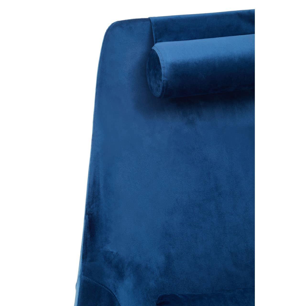 Blue velvet chair back with matching cylindrical headrest detail