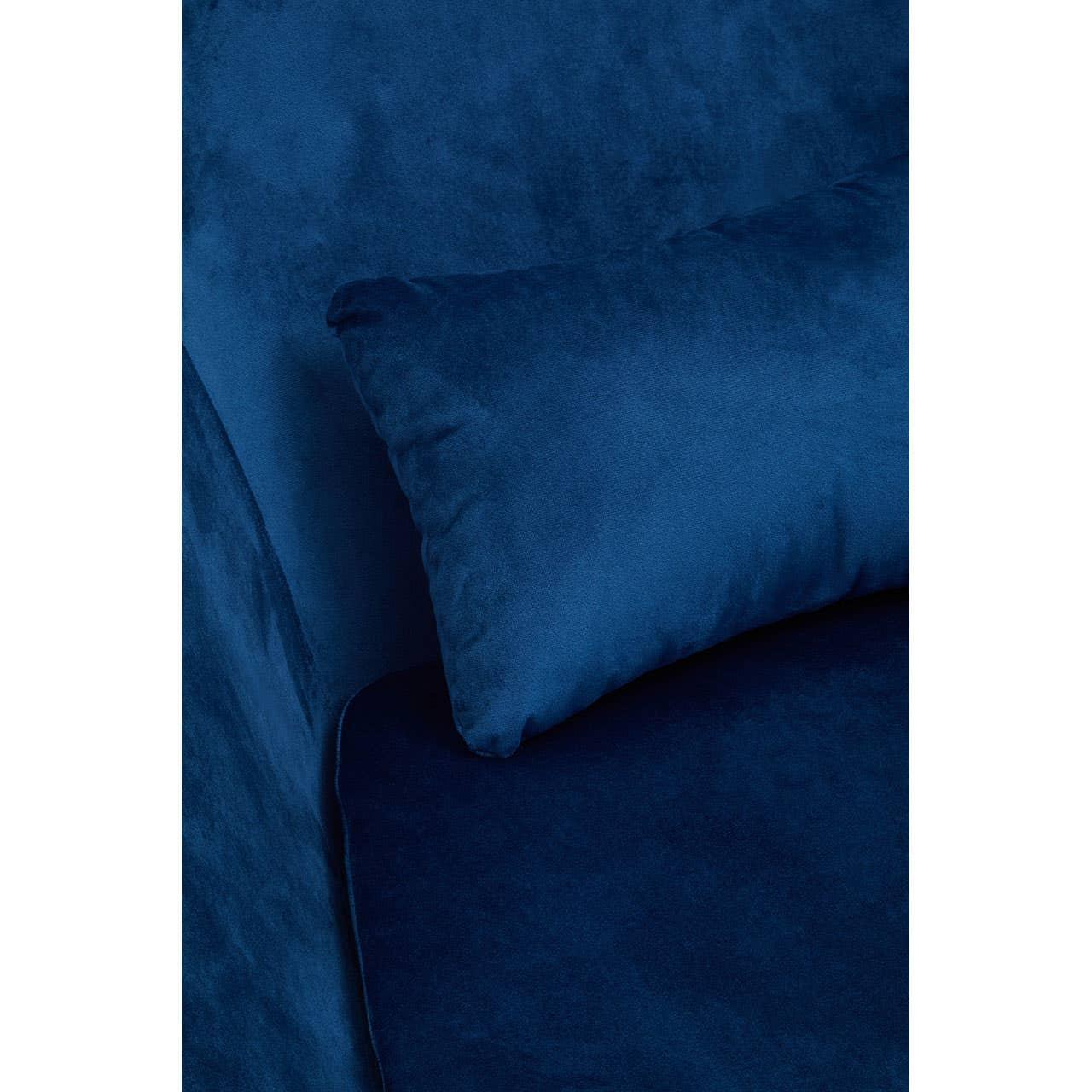 Close-up of blue velvet sofa cushion and seat detail