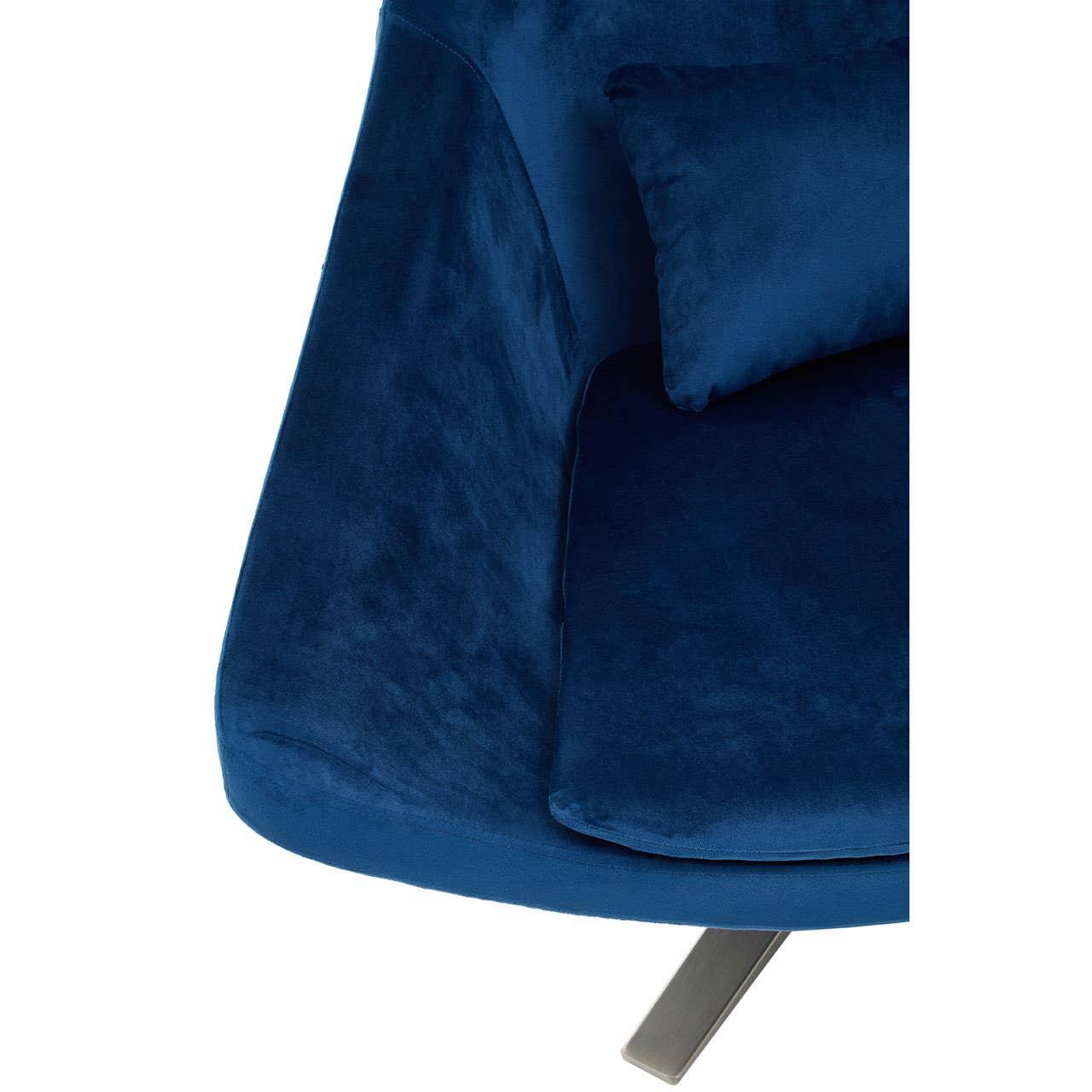 Blue velvet sofa seat with cushion and metal leg detail, corner angle view