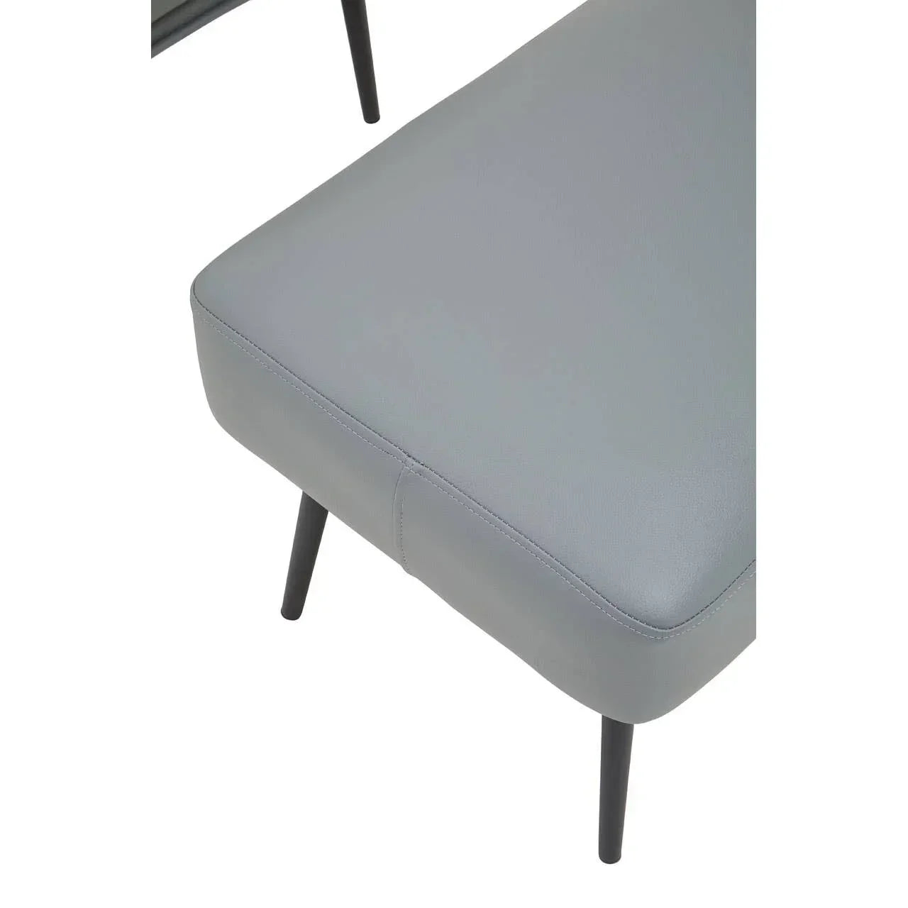 Grey faux leather dining chair seat with black metal legs, angled top view