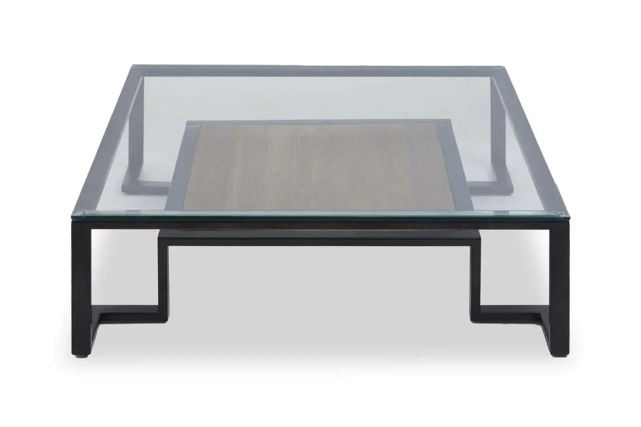 Glass top coffee table with black metal frame and wood accent panel, front view