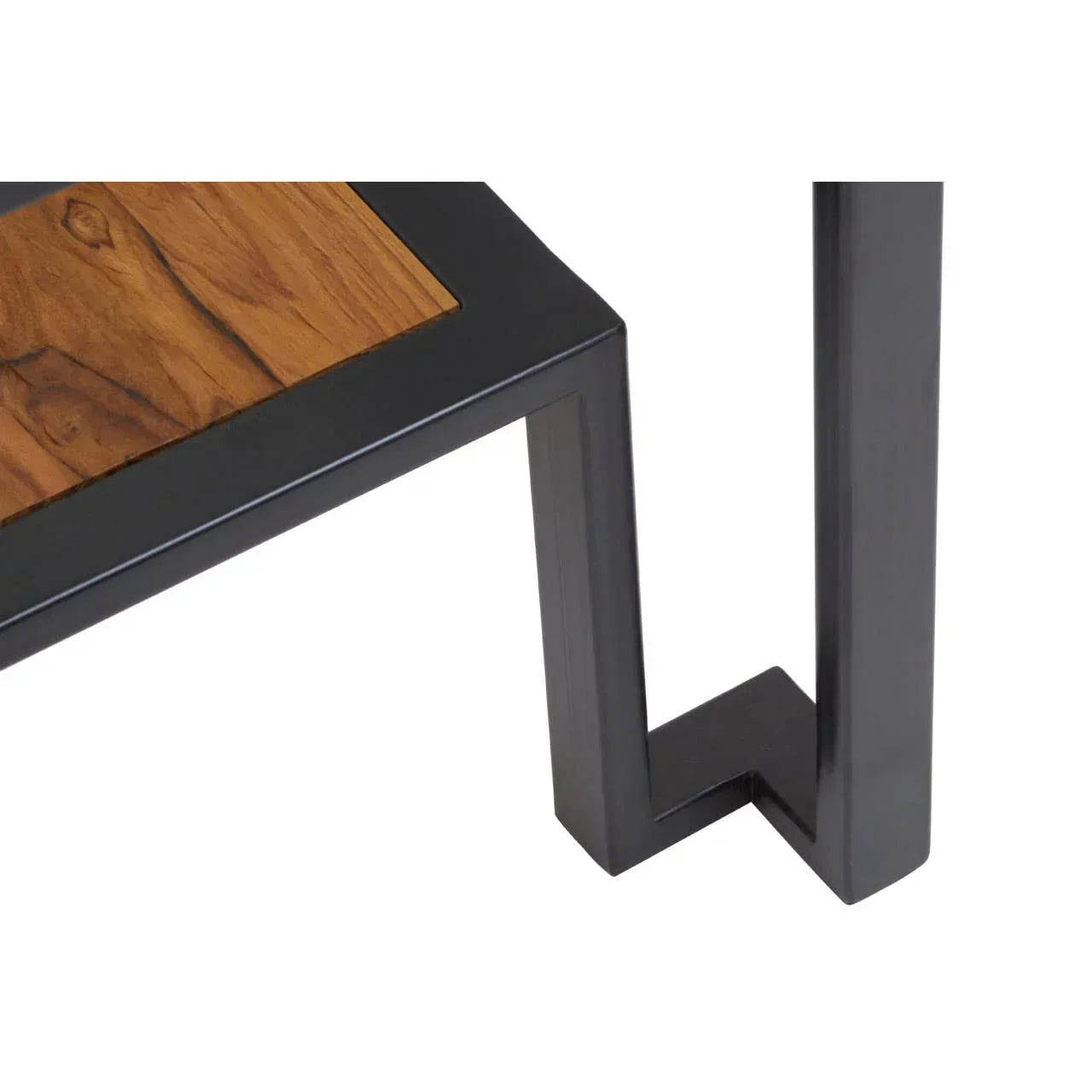 Close-up of corner joint on wooden and black metal furniture frame