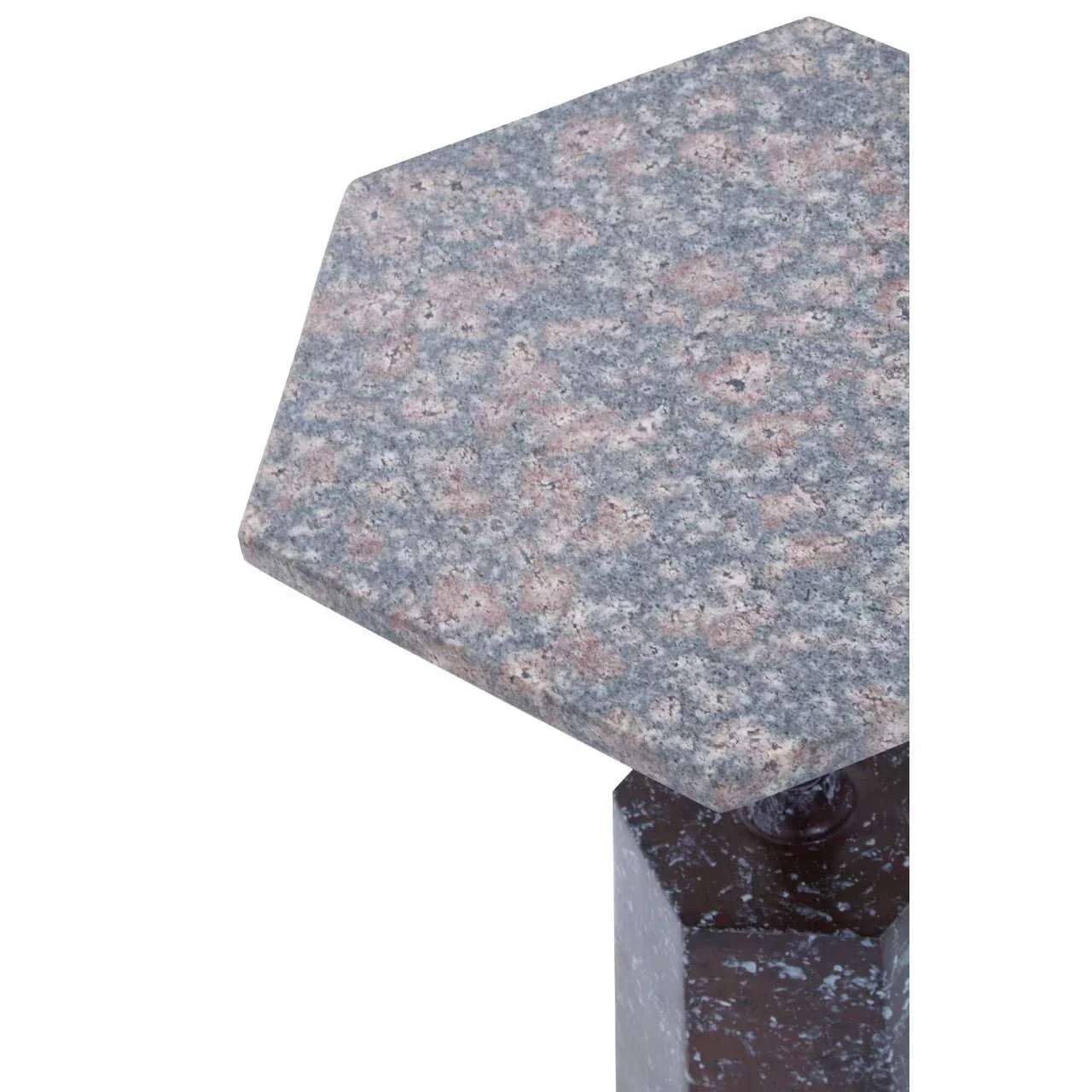 Hexagonal granite side table top with speckled grey and pink finish, close-up view