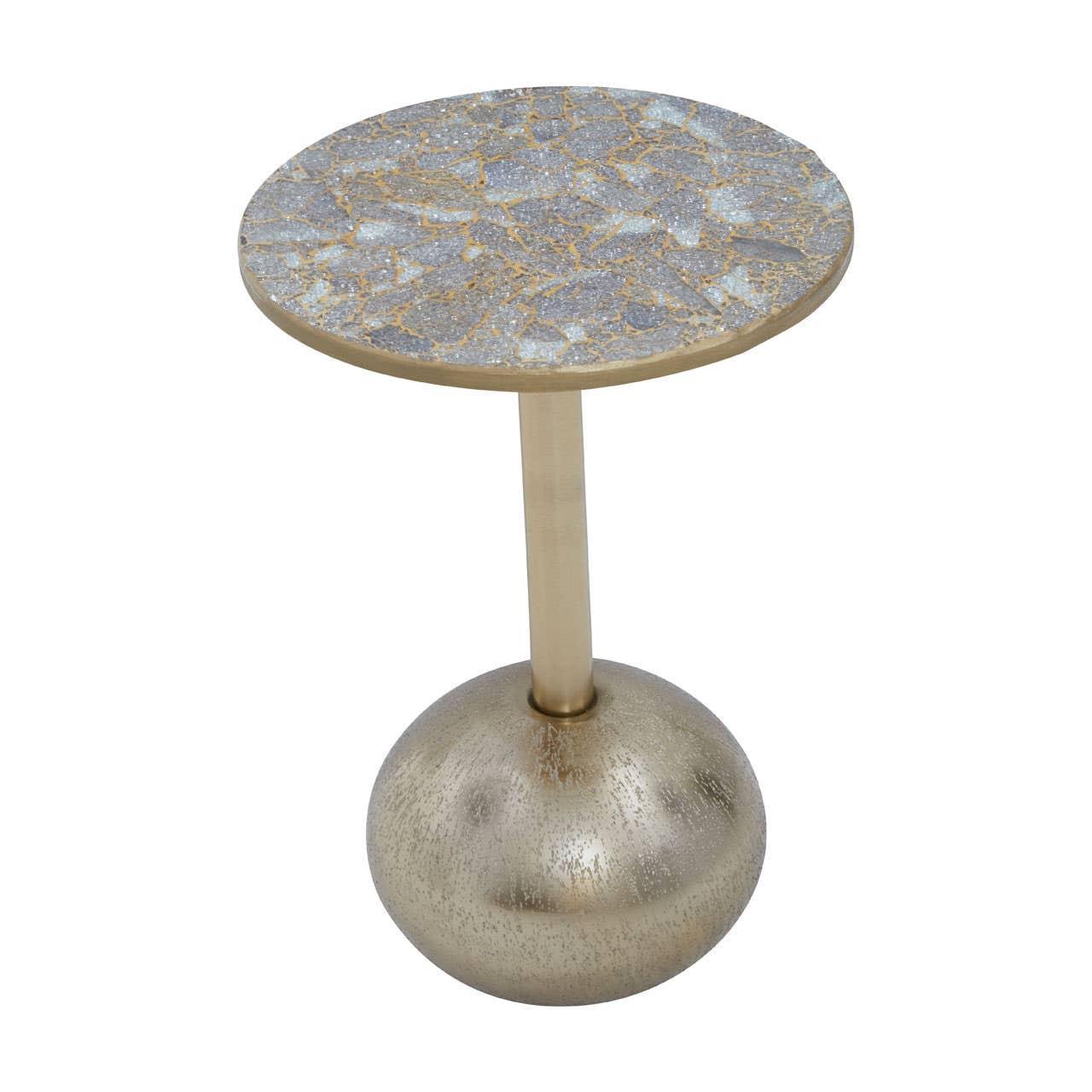 Round side table with gold metal base and mosaic marble top