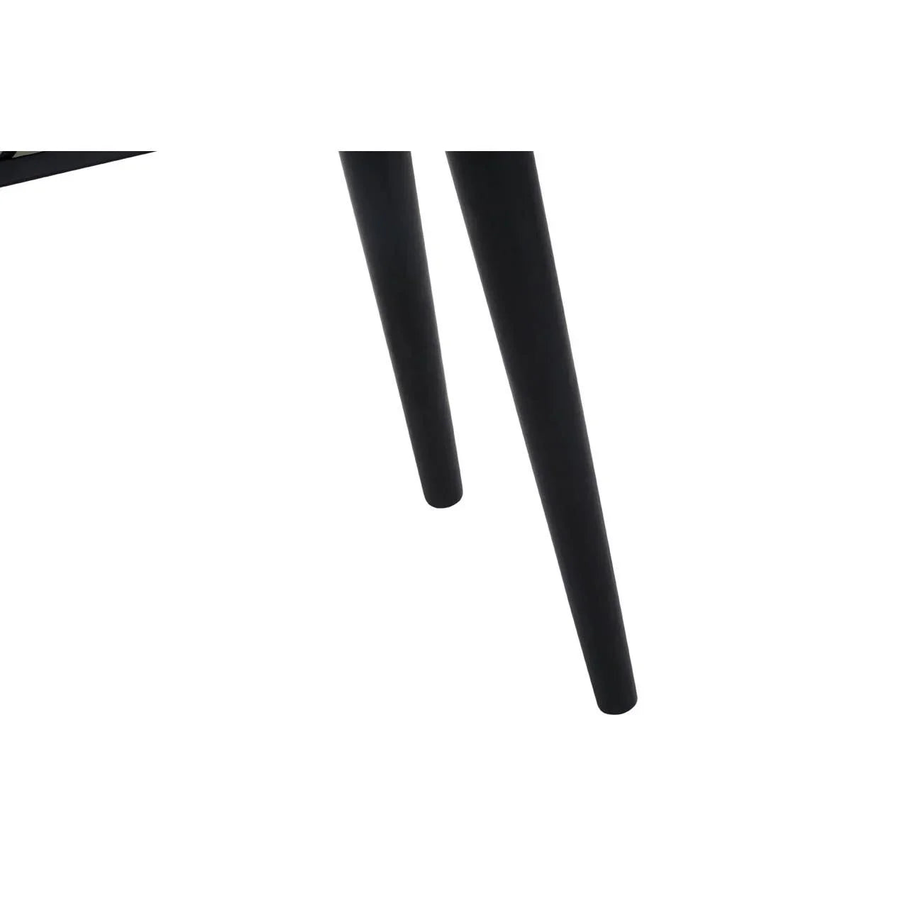 Close-up of black tapered furniture legs with matte finish