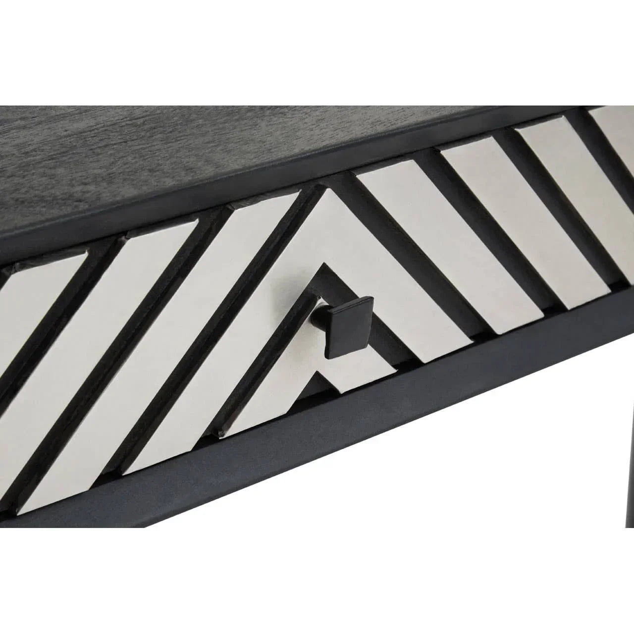 Chevron pattern drawer front on black wood console table with metal handle