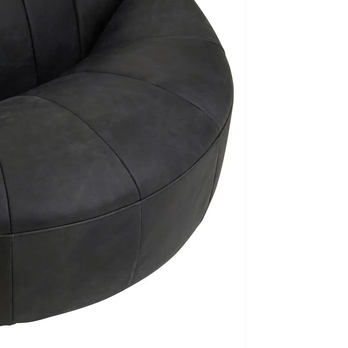 Close-up of black circular fabric sofa with panel stitching