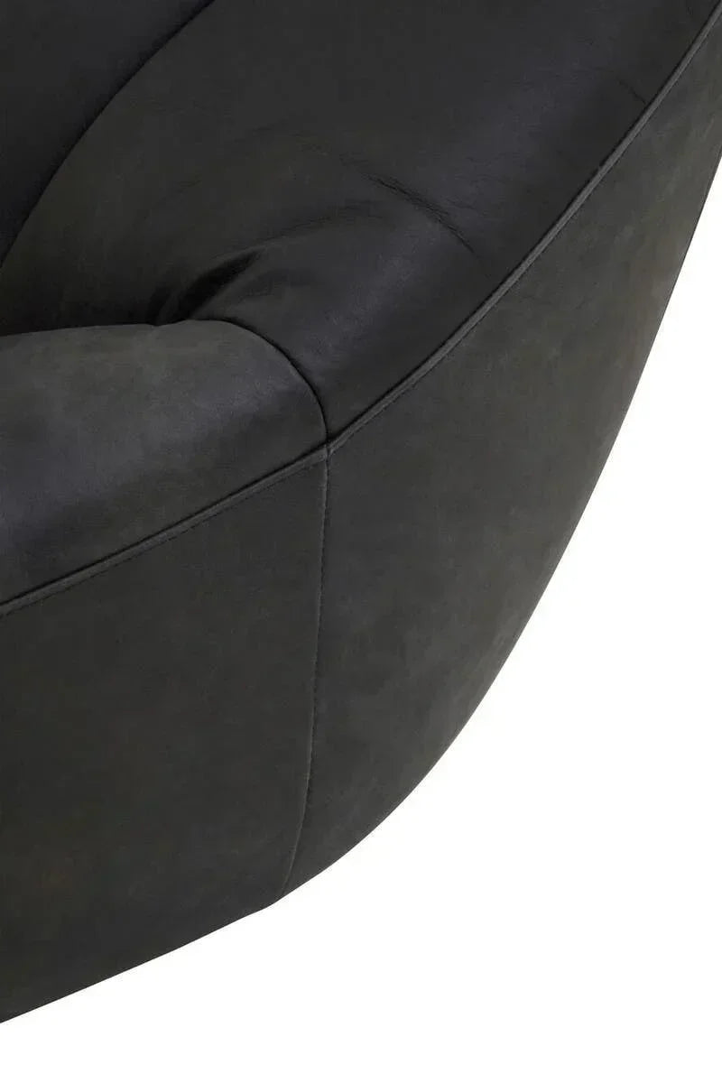 Close up of black fabric sofa armrest and stitching detail