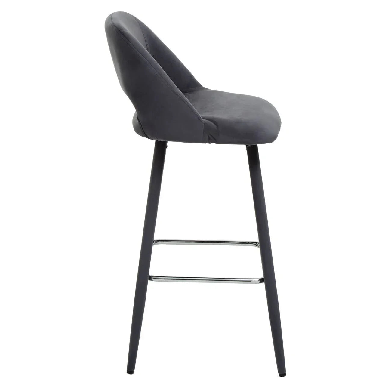 Grey upholstered bar stool with curved backrest and metal footrest, side profile view