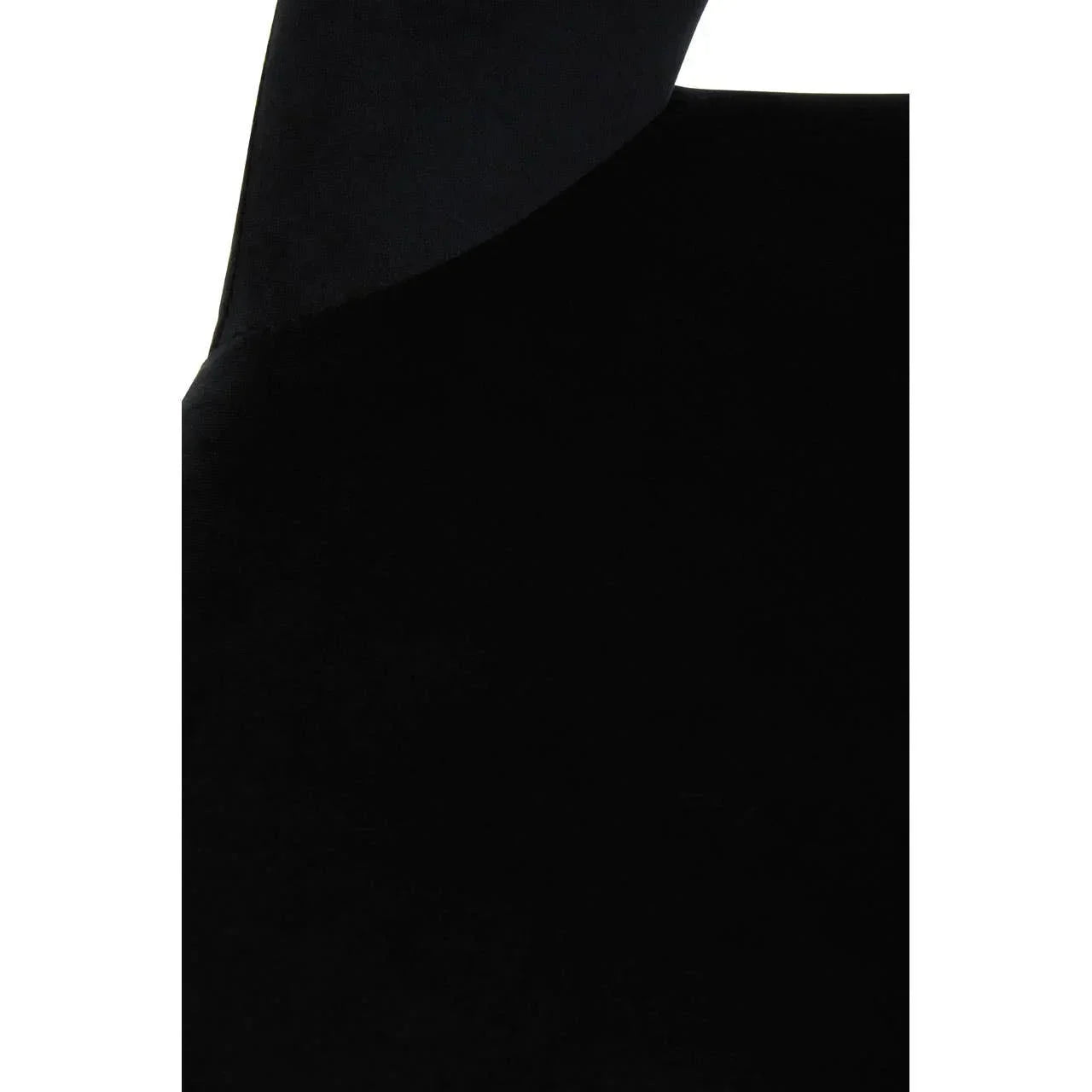 Close-up of black velvet dining chair backrest and seat upholstery