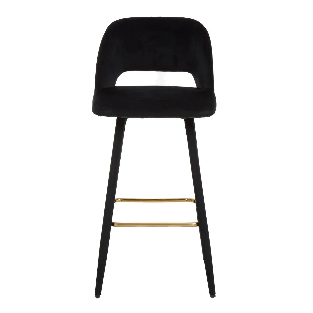 Black velvet bar stool with curved backrest, gold footrest, and slim black legs, front view