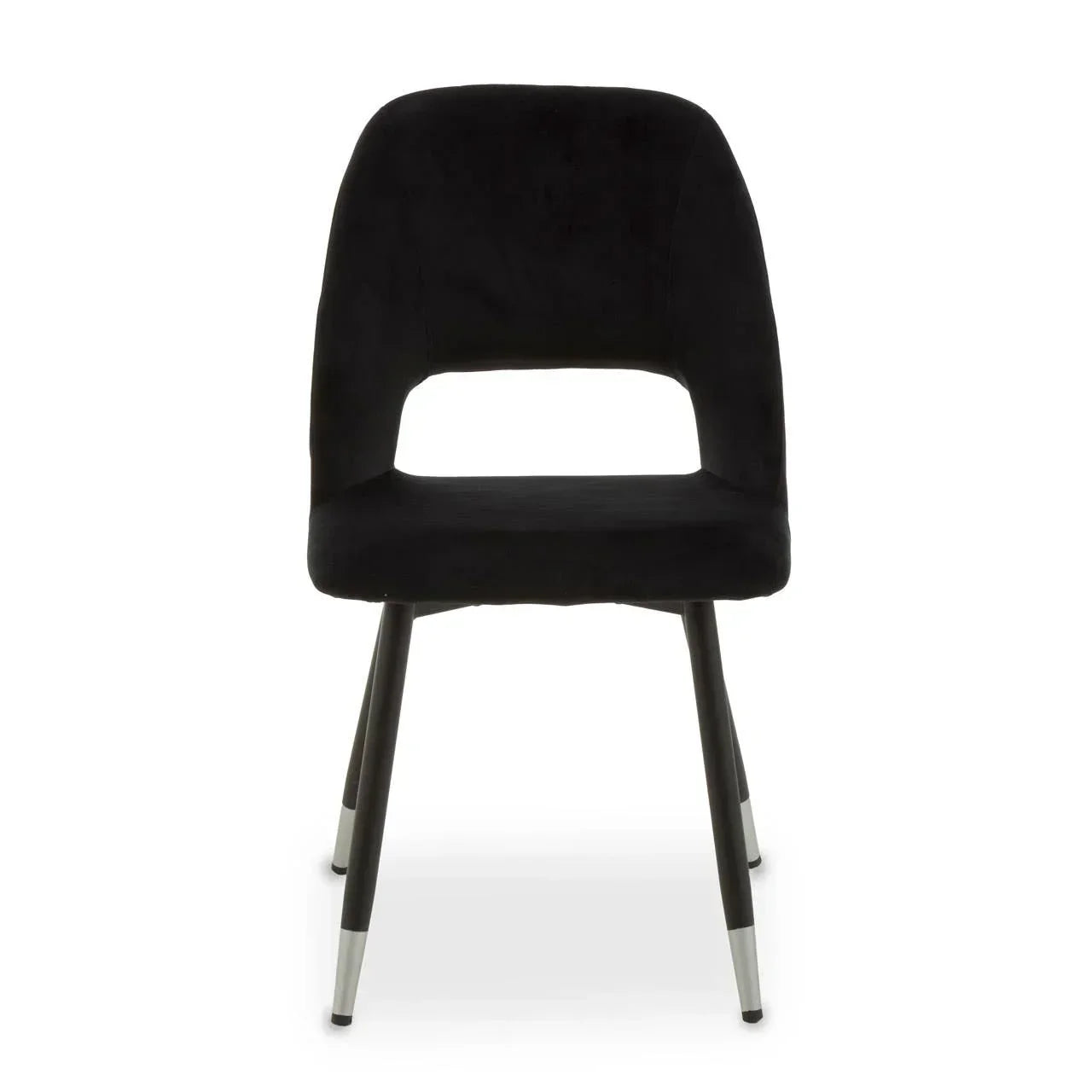 Black velvet dining chair with chrome-tipped legs, front view