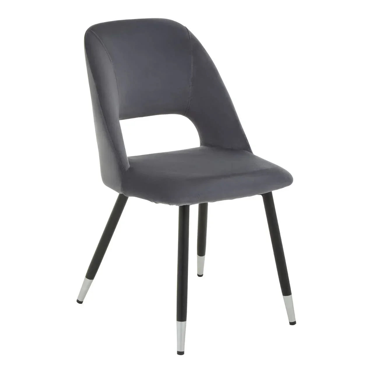 Grey velvet dining chair with open backrest and black metal legs with silver tips