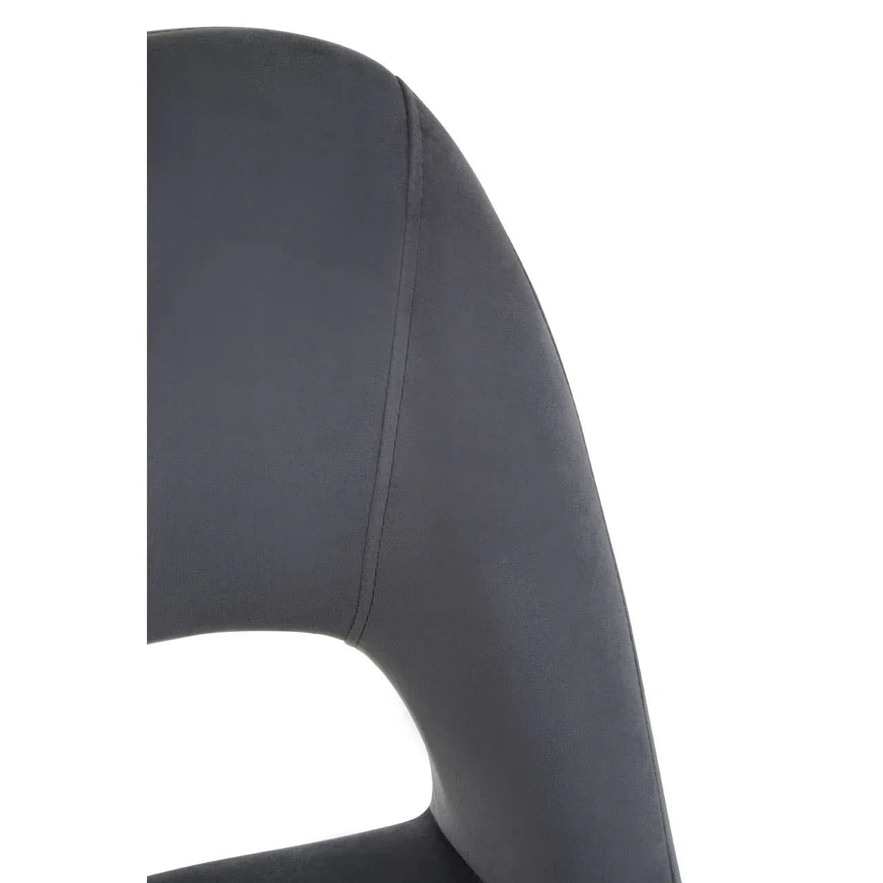 Close-up of grey dining chair backrest with stitched detail and curved design
