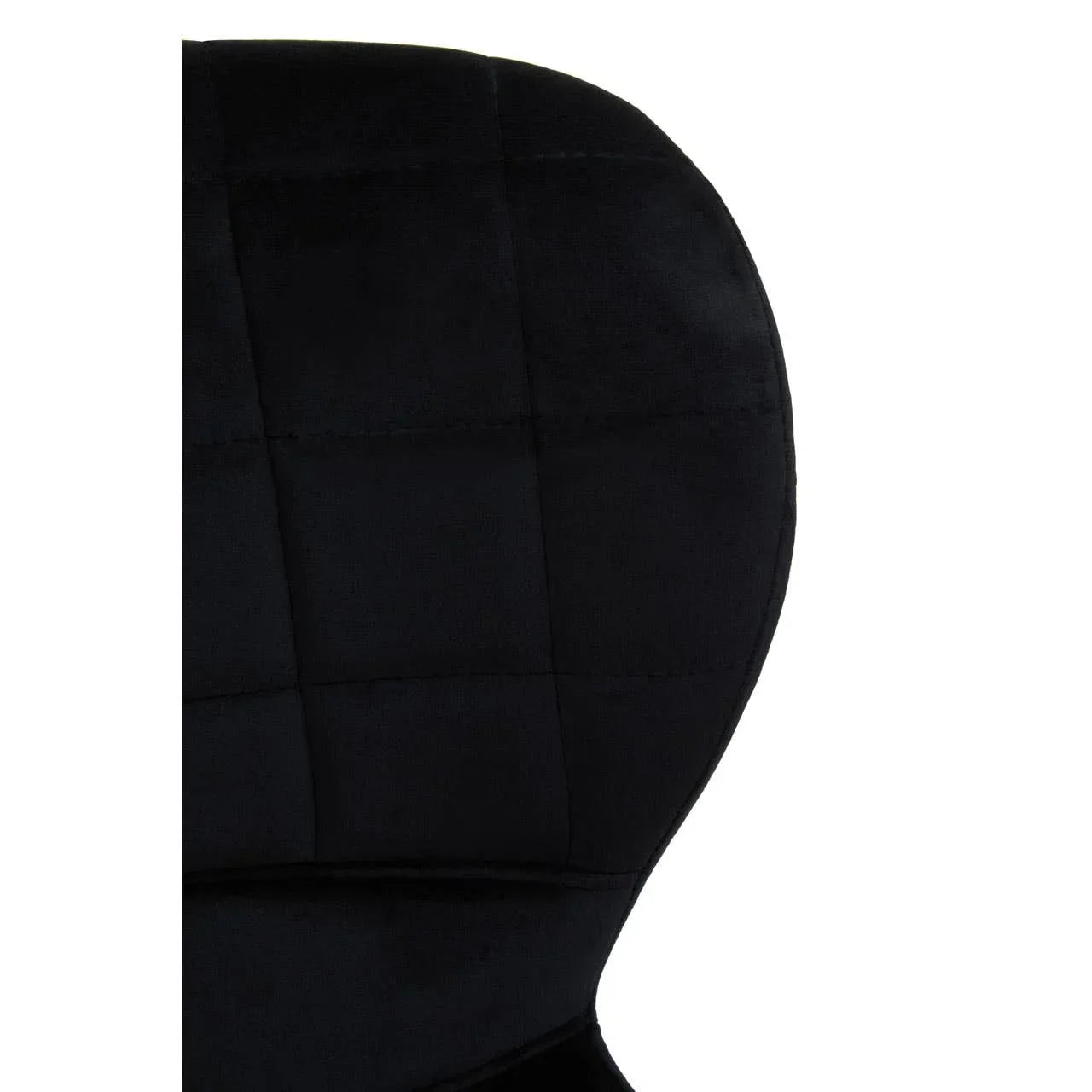Close-up of black fabric dining chair with square stitched backrest