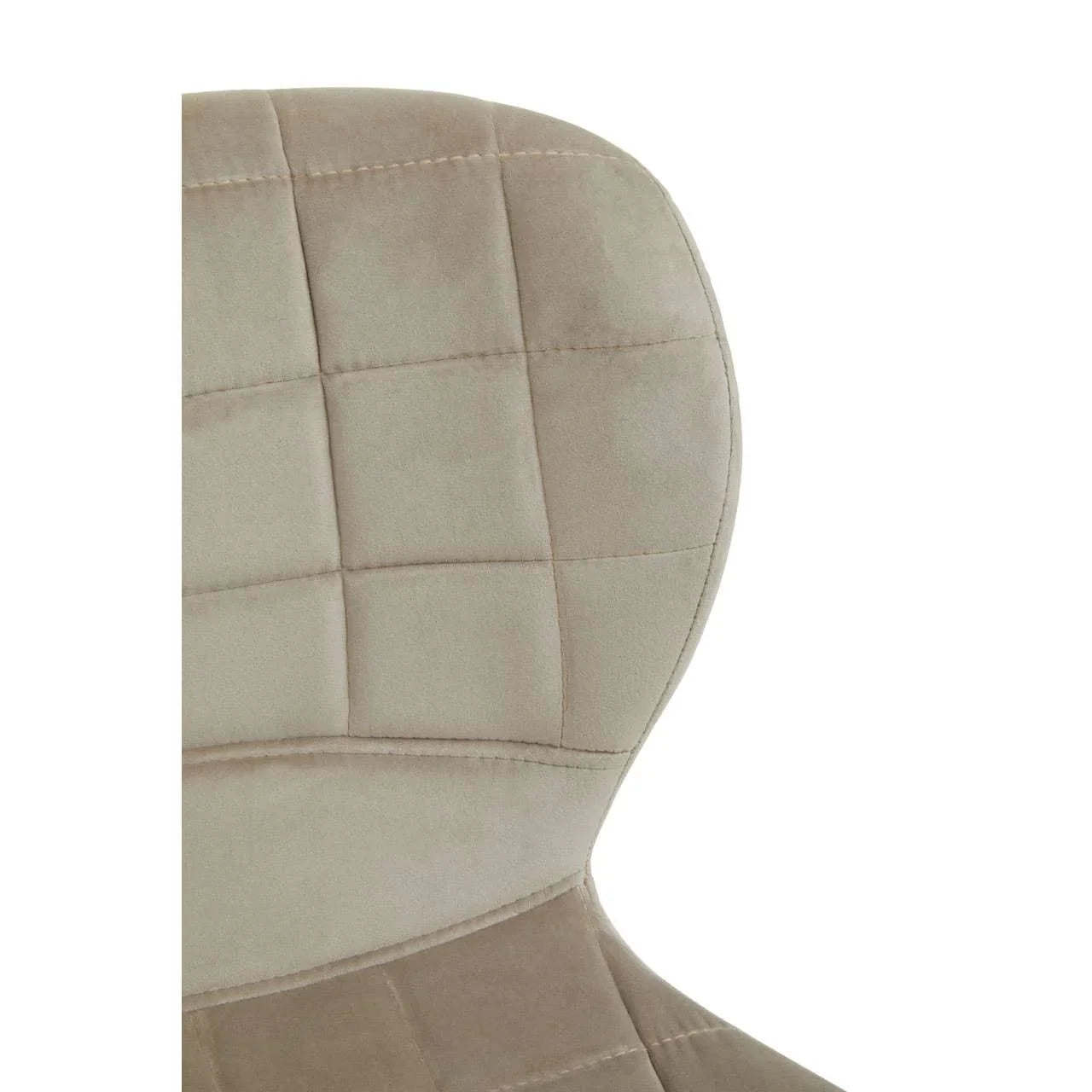 Close-up of beige velvet dining chair with square stitched backrest