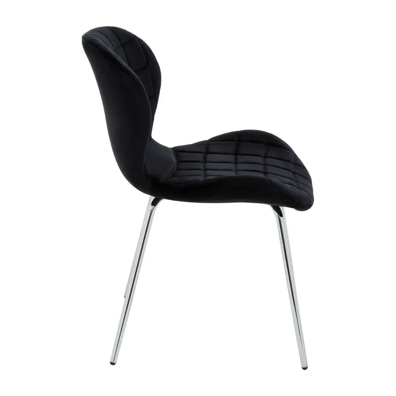 Black dining chair with chrome legs and curved quilted seat, side view