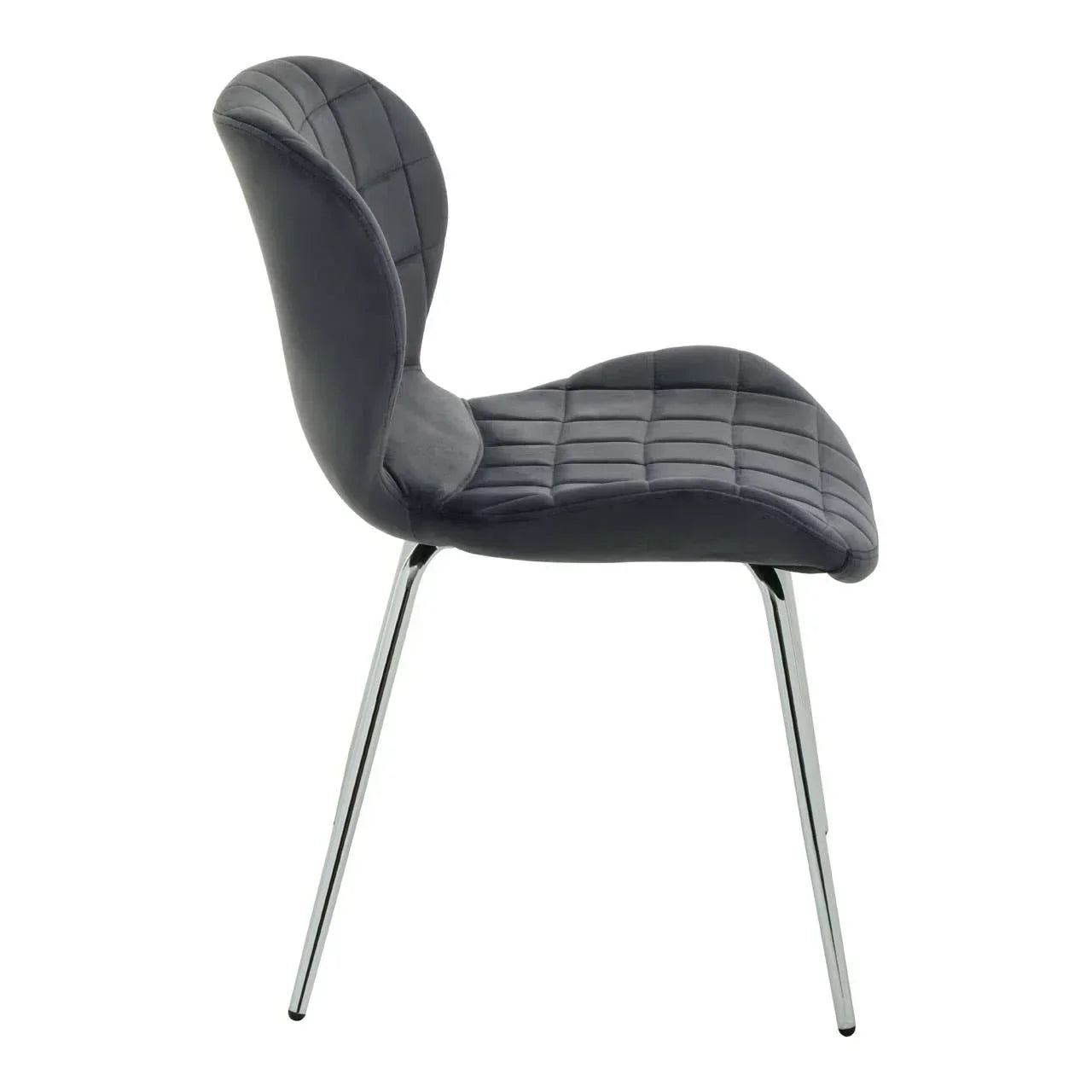 Grey velvet dining chair with quilted seat and chrome legs, side view