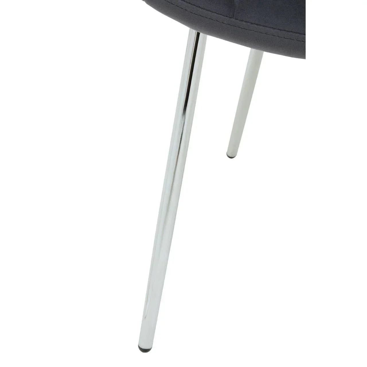 Close-up of chrome chair legs with black upholstered seat