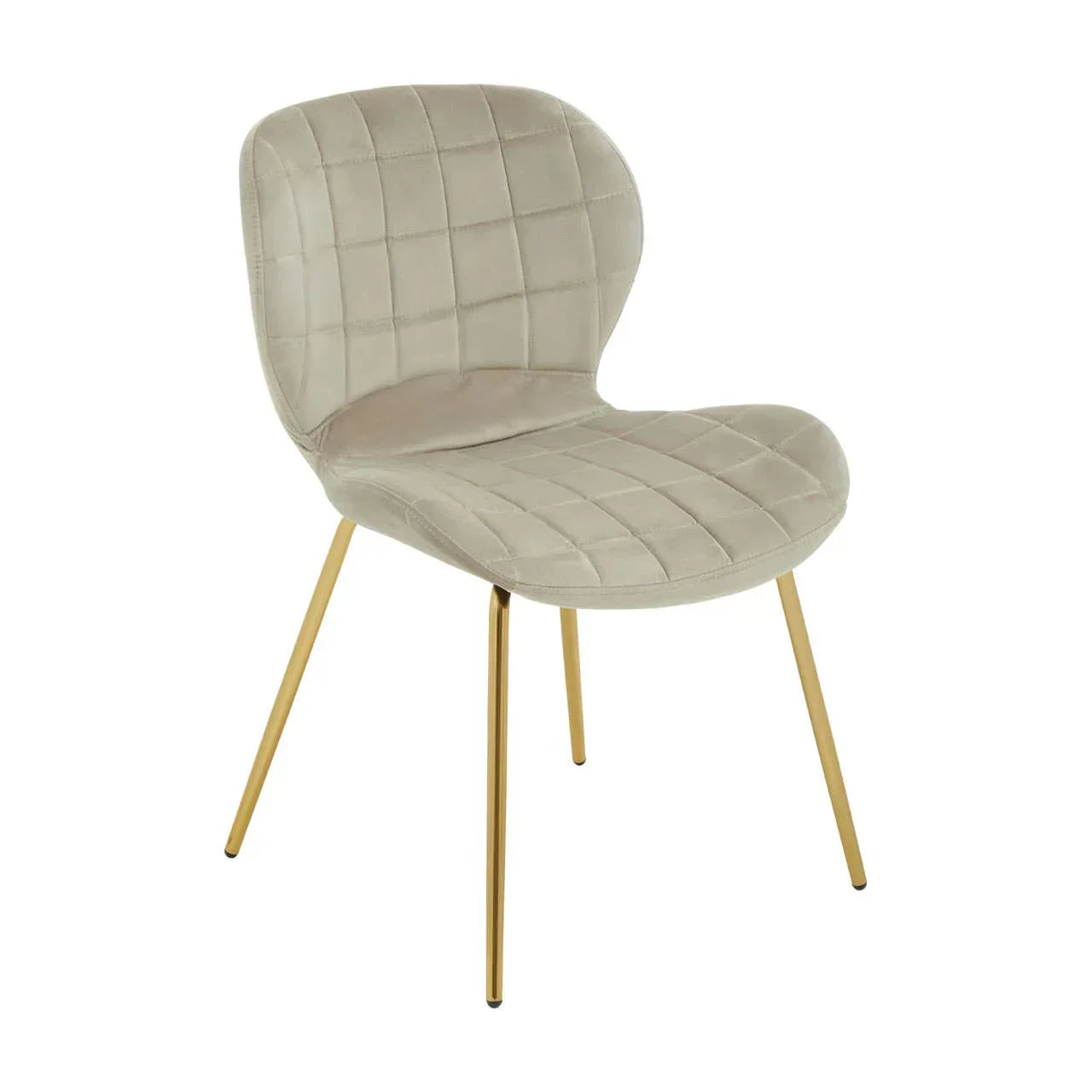 Beige velvet dining chair with gold legs and quilted seat on white background