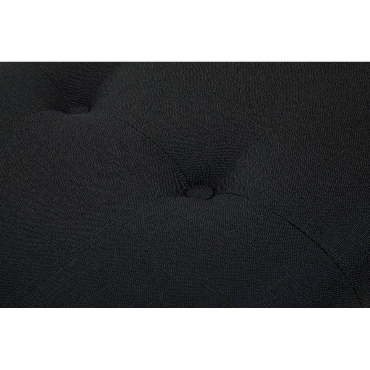 Close-up of black fabric sofa cushion with button-tufted detail