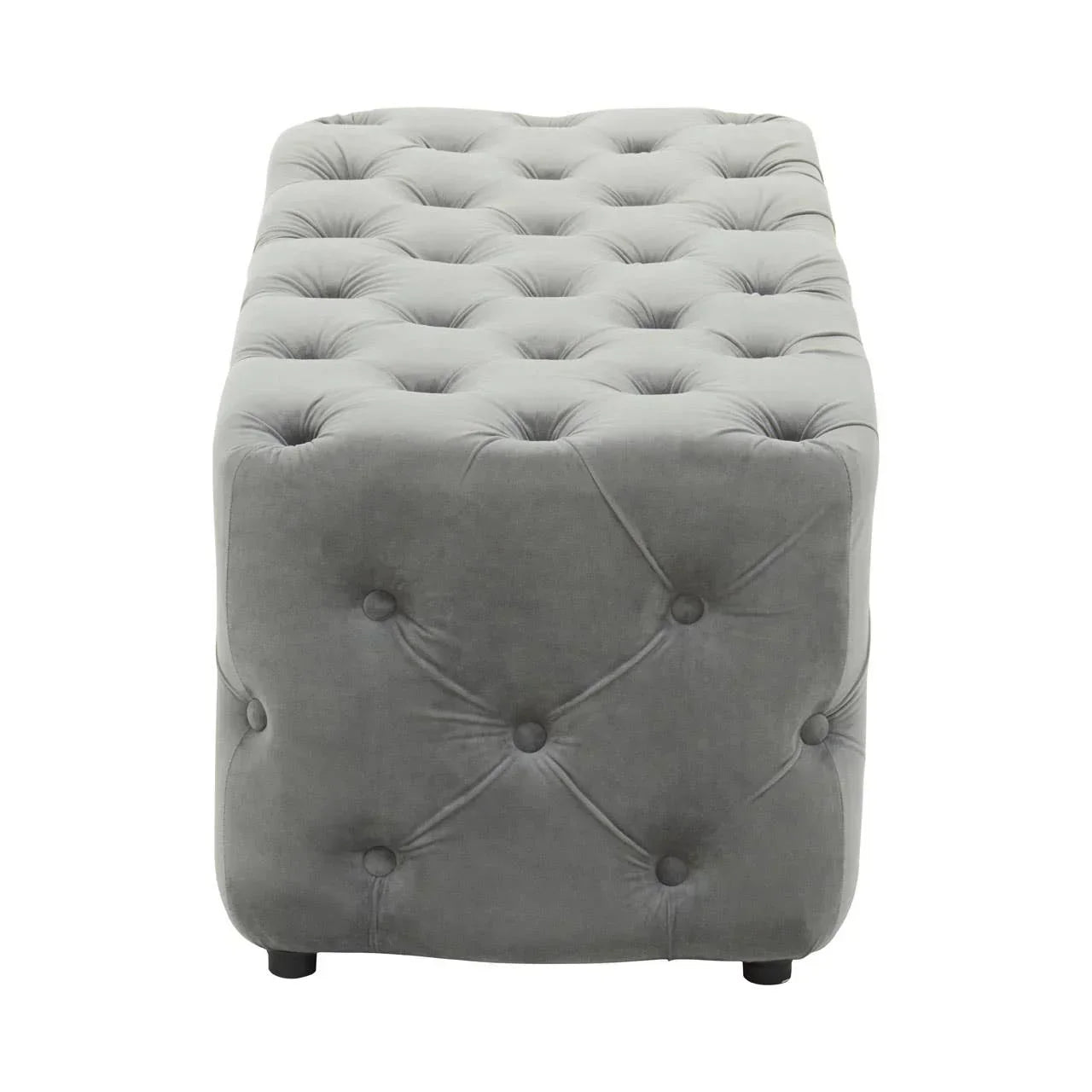 Grey velvet upholstered ottoman bench with deep button tufting, front view
