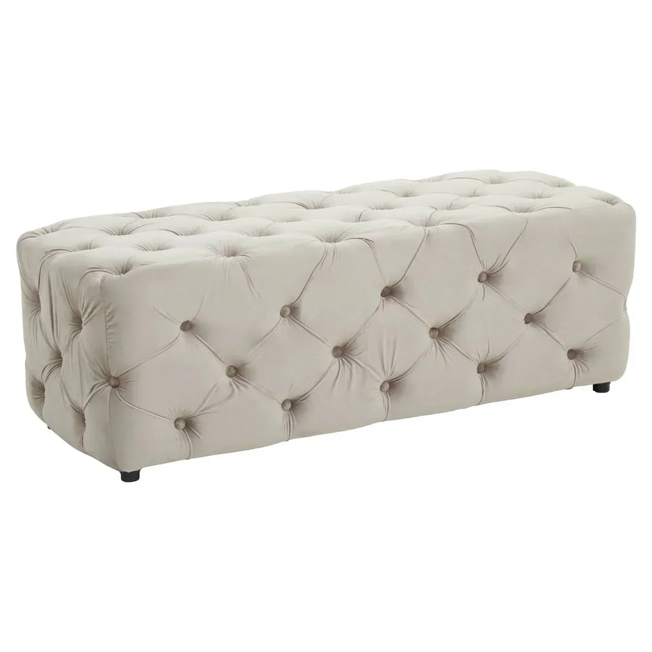 Beige velvet upholstered ottoman bench with button-tufted design and short black legs