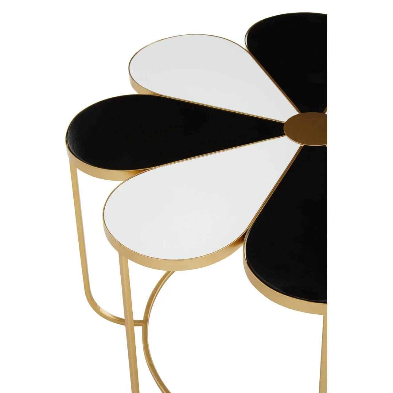 Black and white flower shaped side table with gold metal frame close up