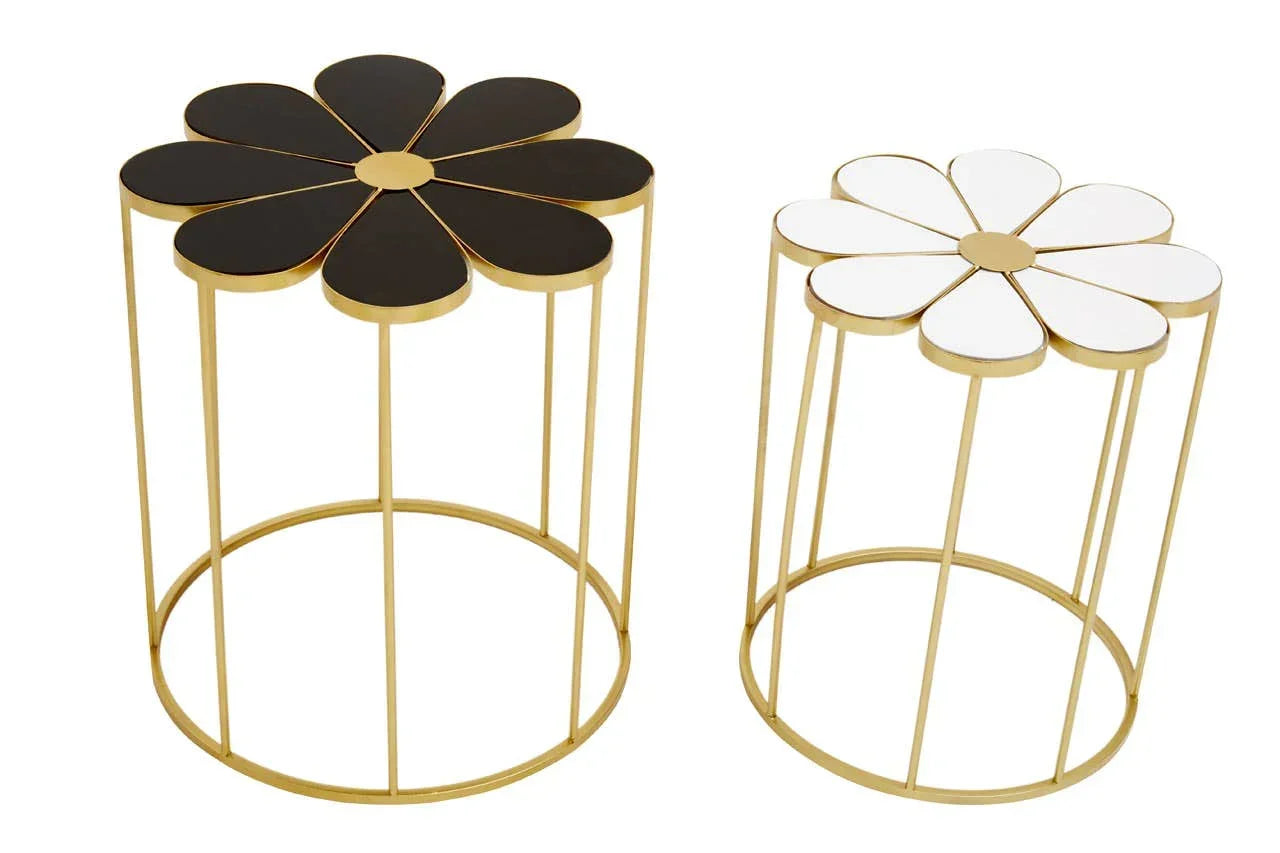 Set of two flower-shaped side tables with gold frames, one with black top, one with white top