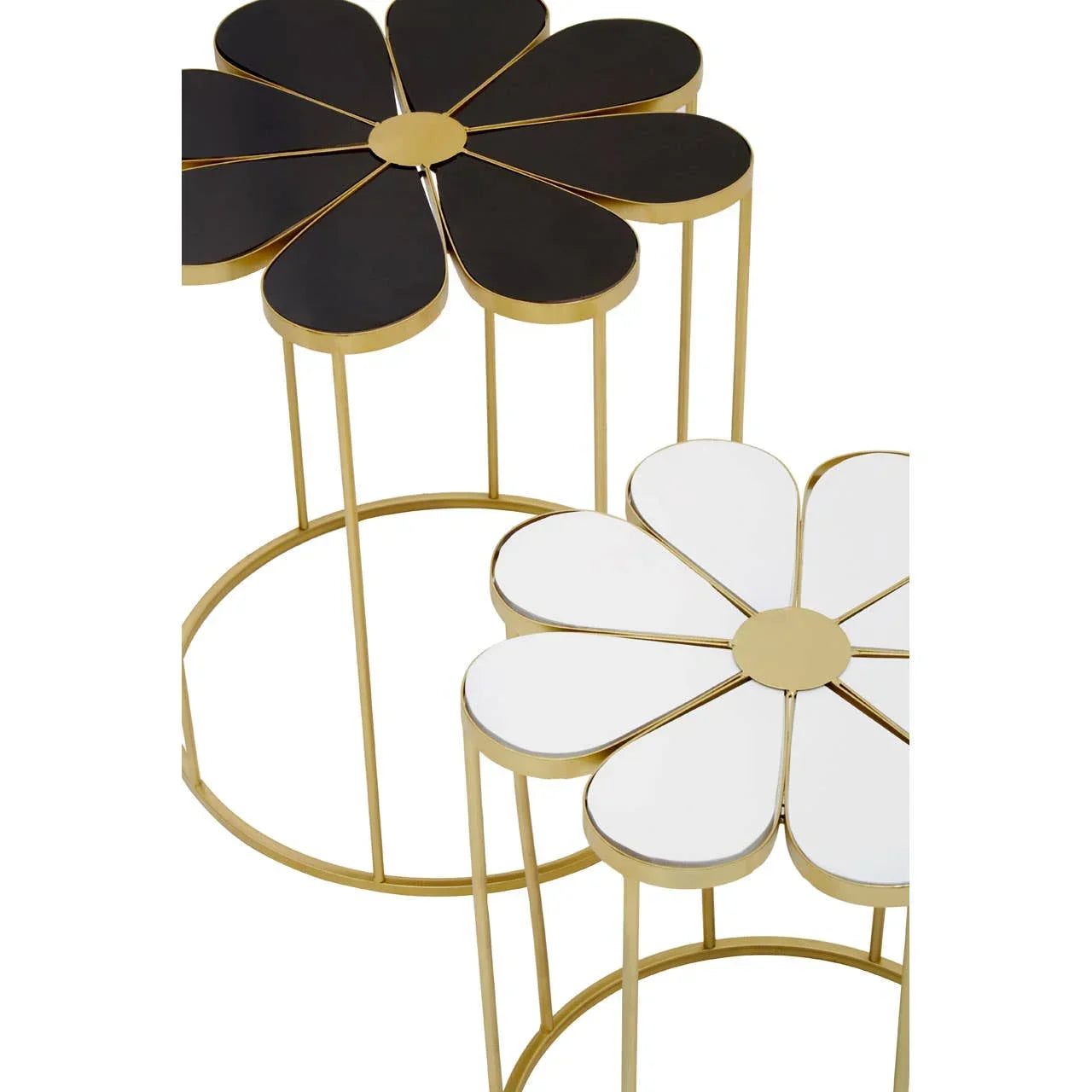 Set of two flower shaped side tables with gold frames, one with black petals, one with white