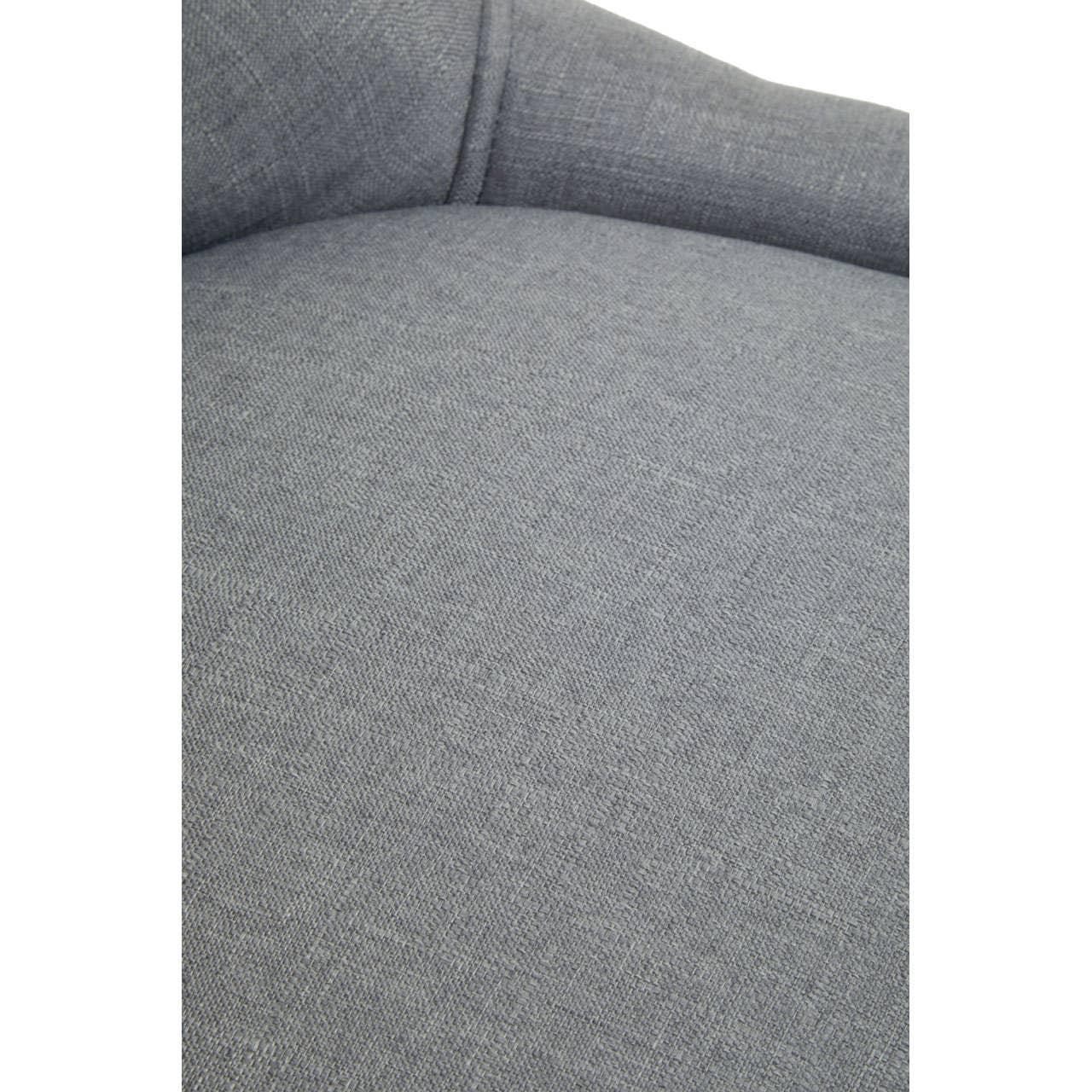Close-up of grey fabric sofa seat cushion with textured upholstery