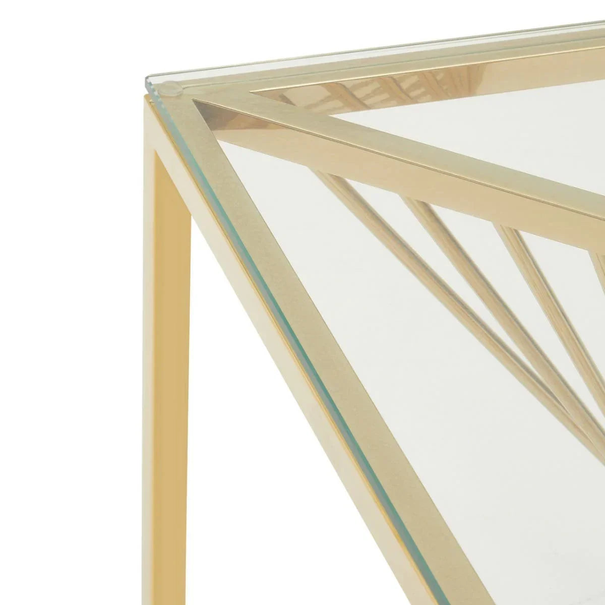 Corner view of glass coffee table with gold metal frame