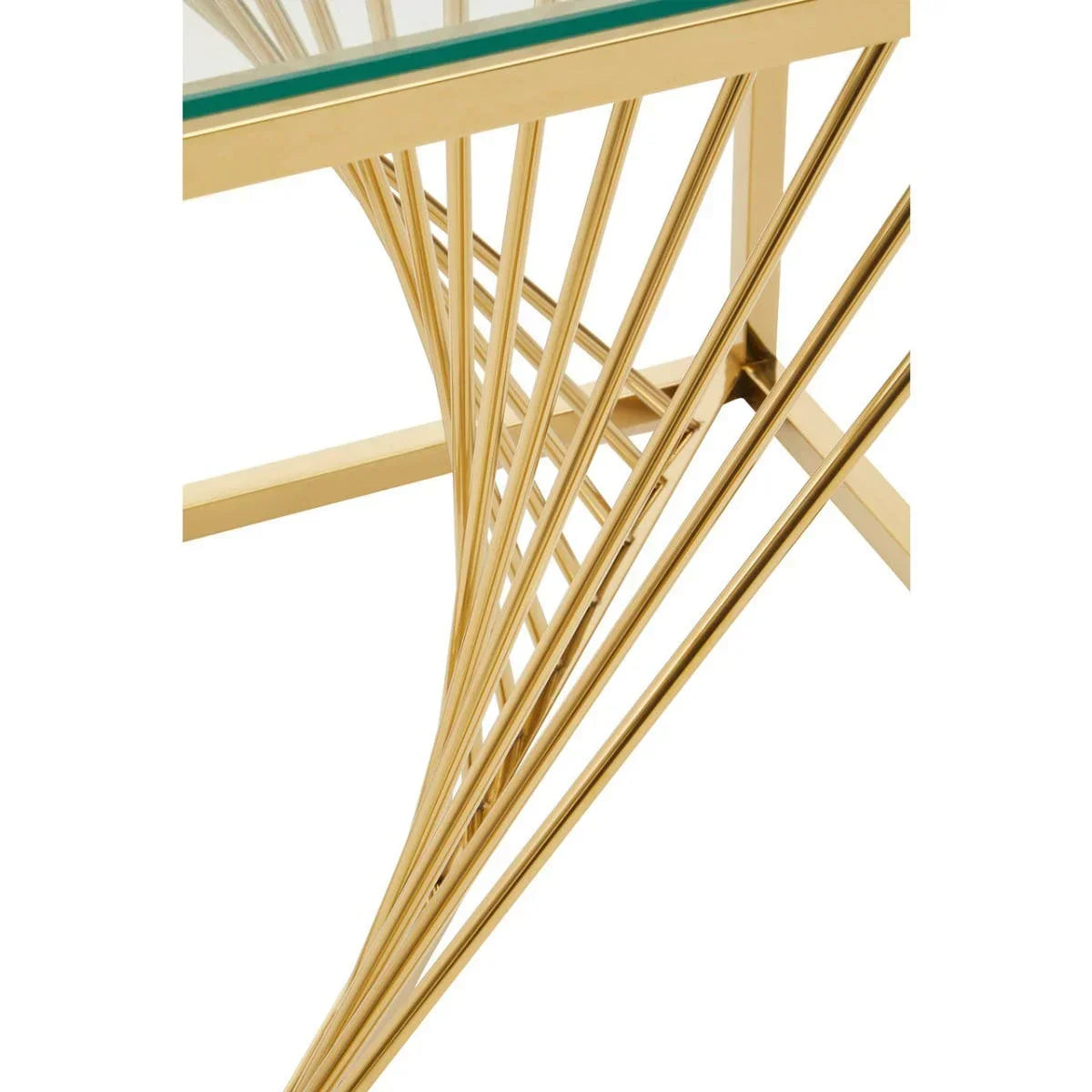 Close view of glass top table with gold metal frame and geometric support design