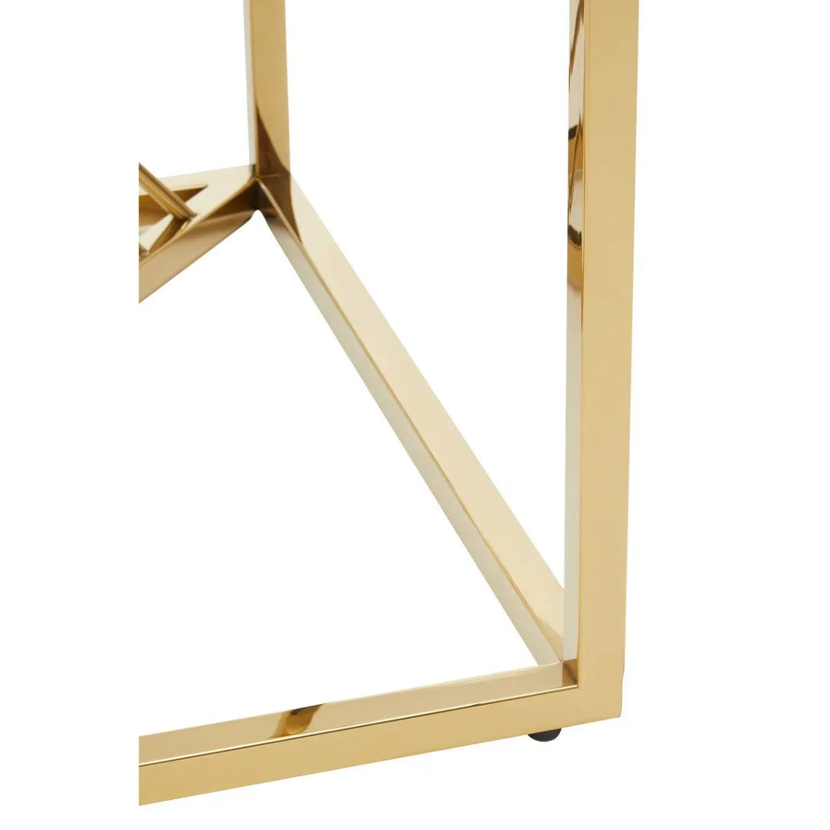 Gold metal table frame with clean geometric lines, close-up corner view