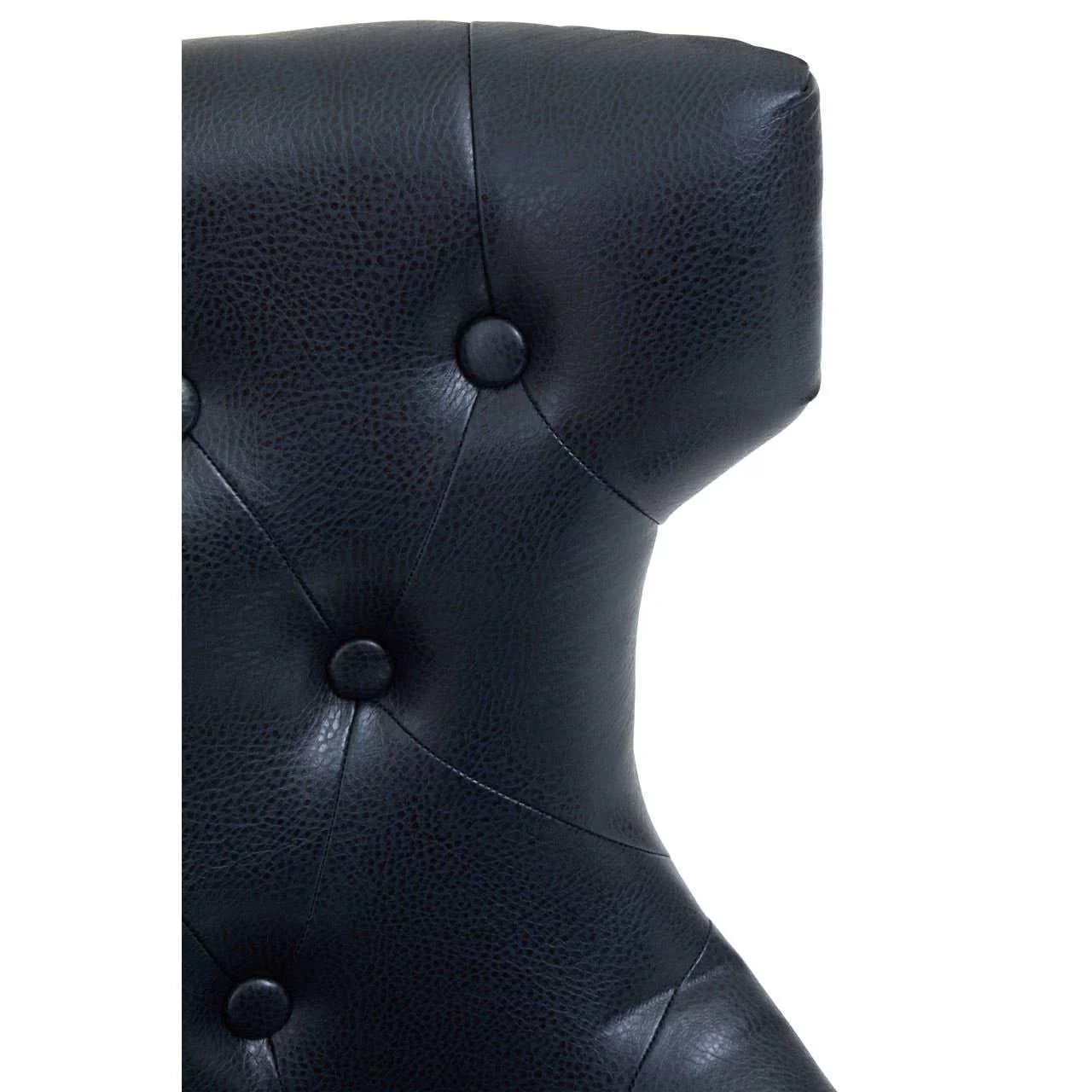 Close-up of black leather dining chair with button-tufted backrest detailing