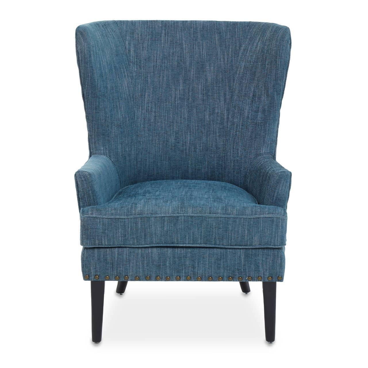 Blue fabric armchair with high wingback and studded trim, front view on wooden legs
