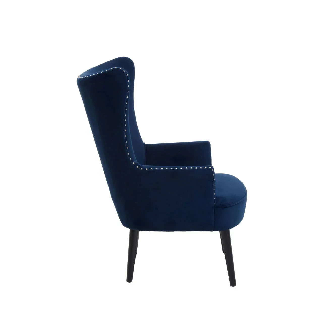 Blue velvet armchair side view with silver stud trim and black legs