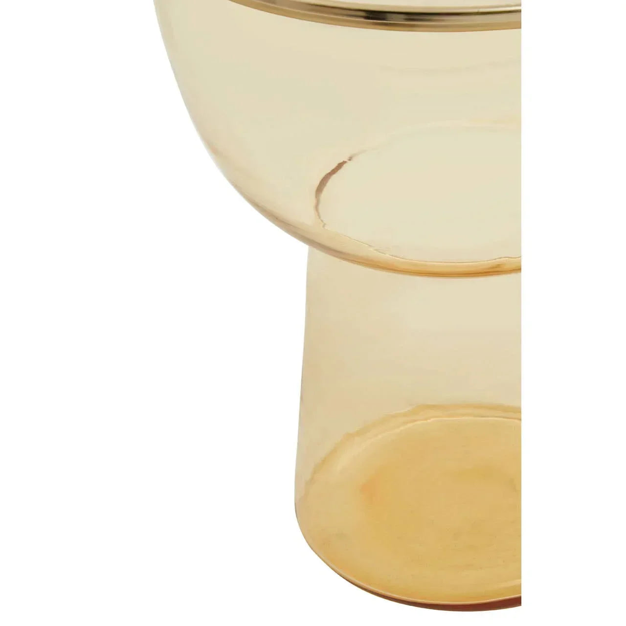 Close-up of amber glass table base with cylindrical shape and smooth finish