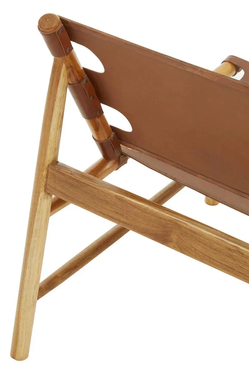 Close-up of wooden chair frame with brown leather seat and angled backrest