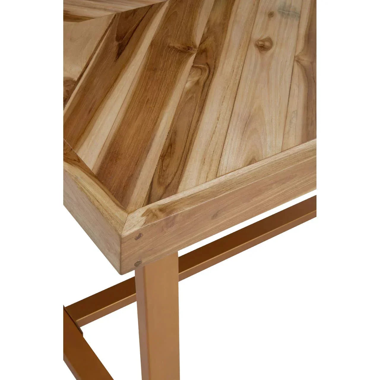 Corner view of wooden dining table with herringbone pattern and metal legs