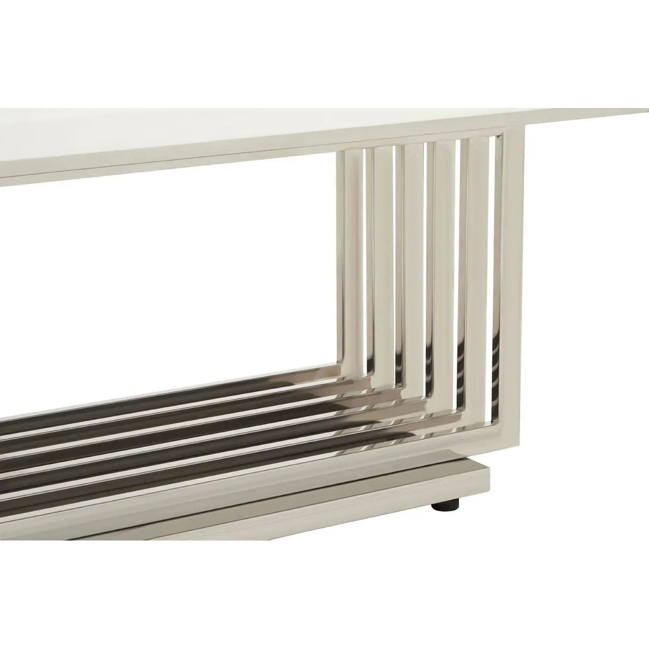 Chrome coffee table base with geometric metal frame and white top detail