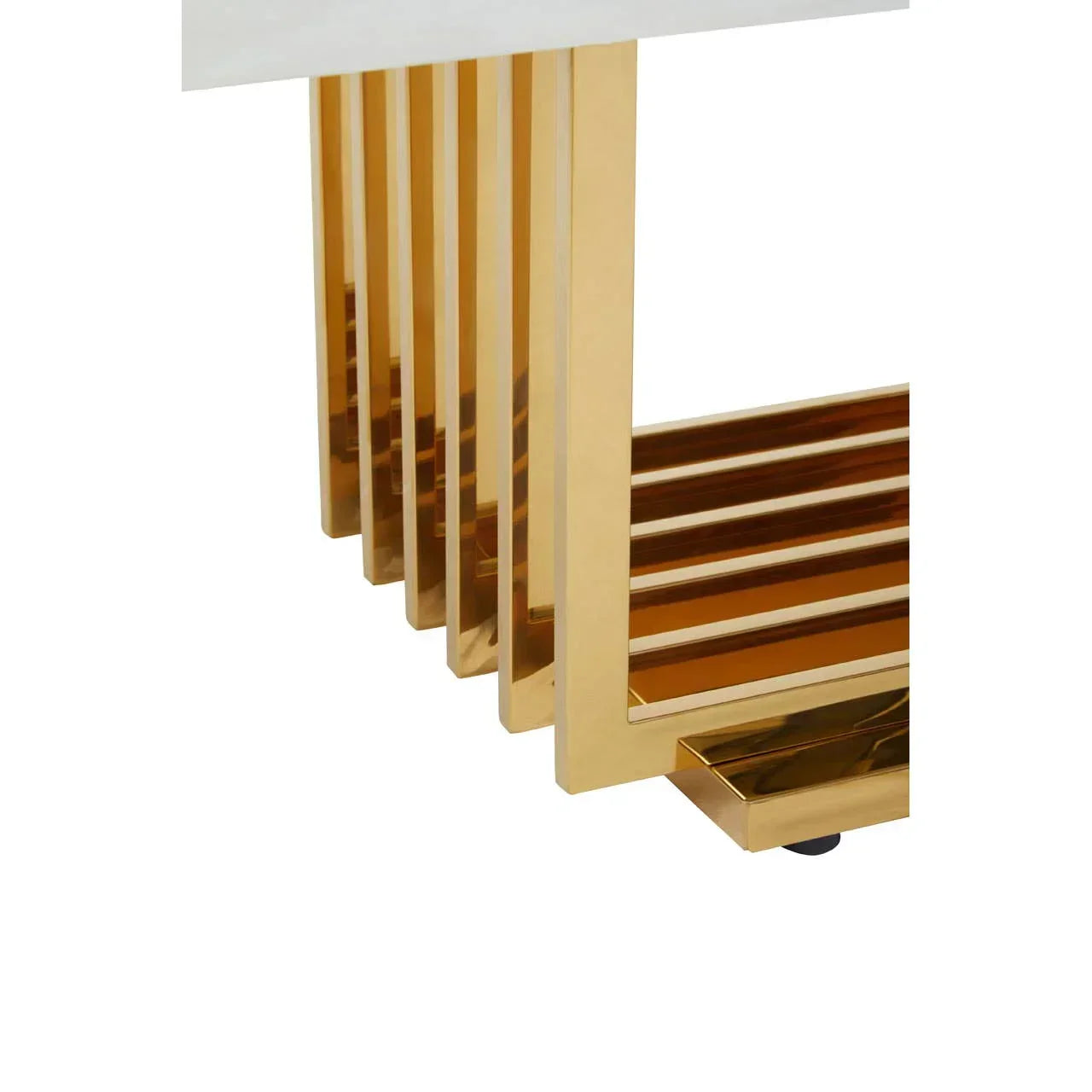 Gold metal coffee table legs and slatted base detail with white tabletop