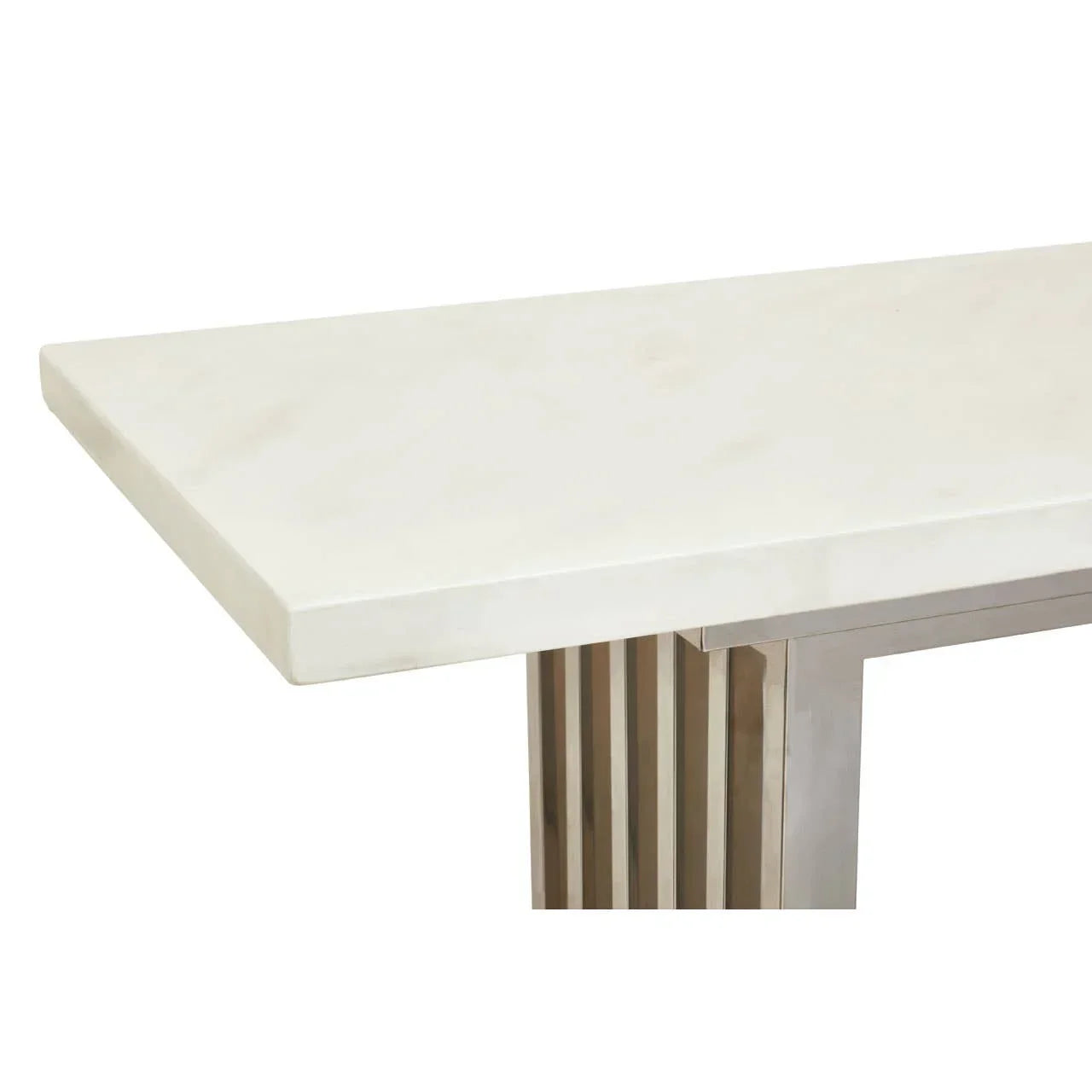 White marble dining table with rectangular stainless steel legs, corner view